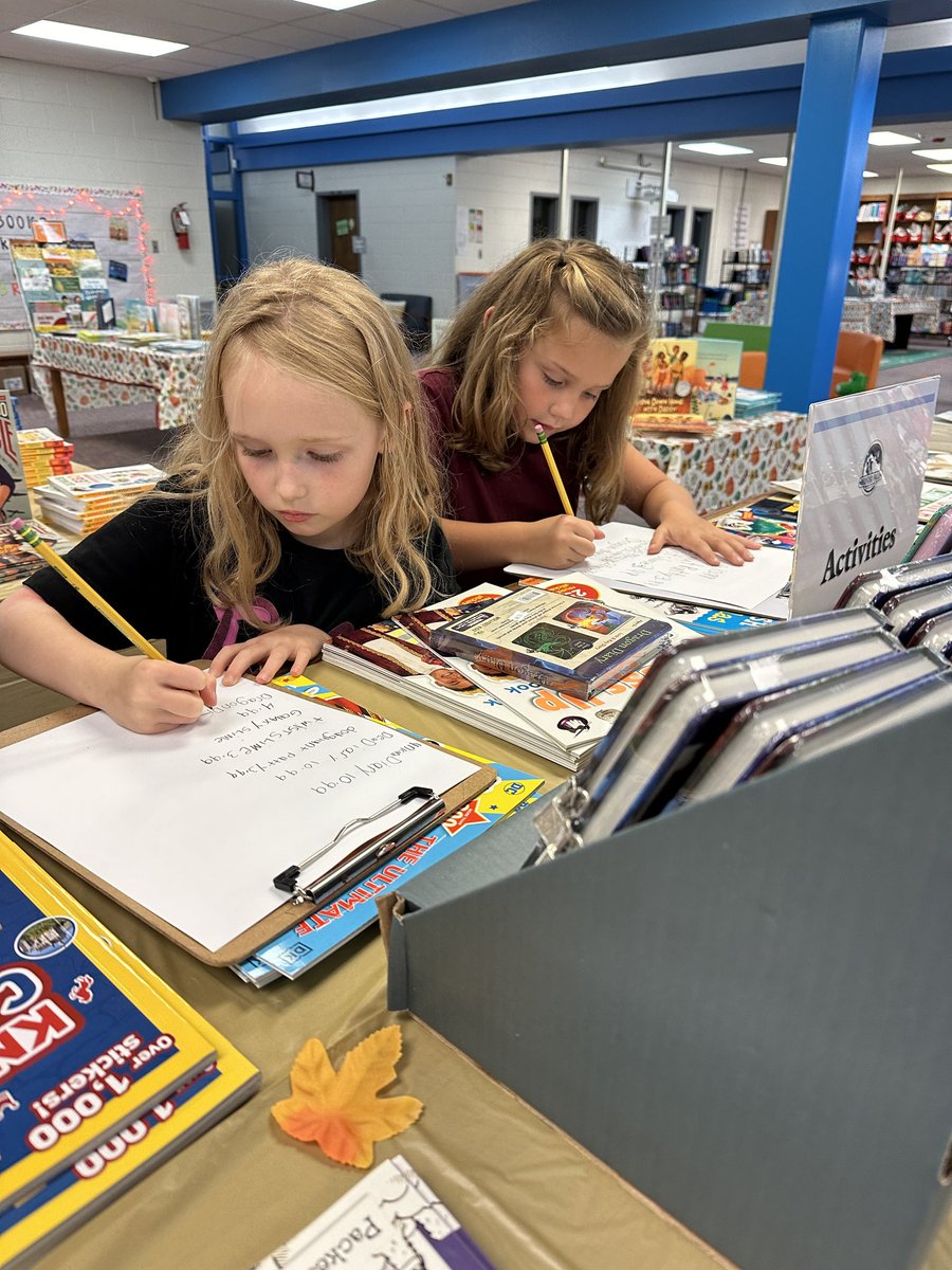 PoquosonSchools's tweet photo. The Book Fair has arrived! Students are taking a book fair browse and making their wish lists in library! Please join us for our family night on Tuesday from 5:00-7:00. Can’t make it? Students can shop Tuesday through Friday morning! https://t.co/ZpSWuypCWB