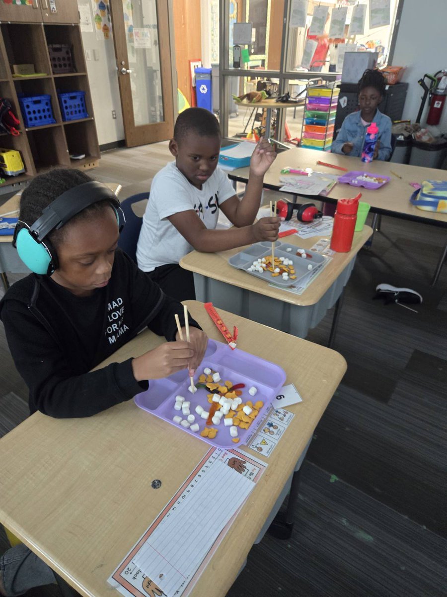 PREPRIDE's tweet image. Students have been studying where animals live and what they eat. They participated in a read-aloud of Birds by Kevin Henke. Then, they used chop sticks to pick up various foods like birds!