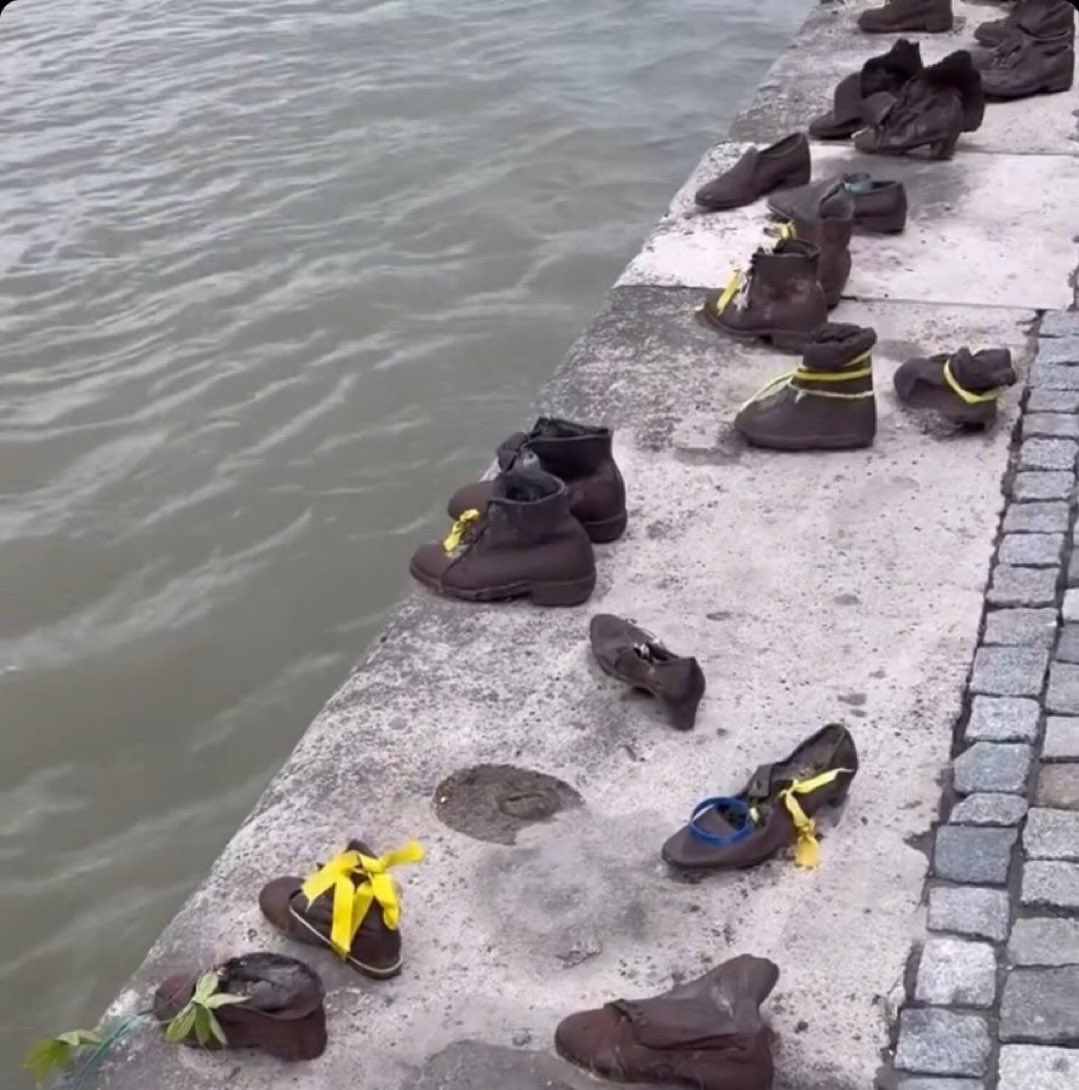 Shoes on the Danube Bank is a Holocaust Memorial in Budapest dedicated to over 20,000 Jews who were marched to the river, forced to remove their shoes, and executed by Nazis in WW2.

Yellow Ribbons are tied to the memorial in honor of those murdered, raped and kidnapped on 10/7.