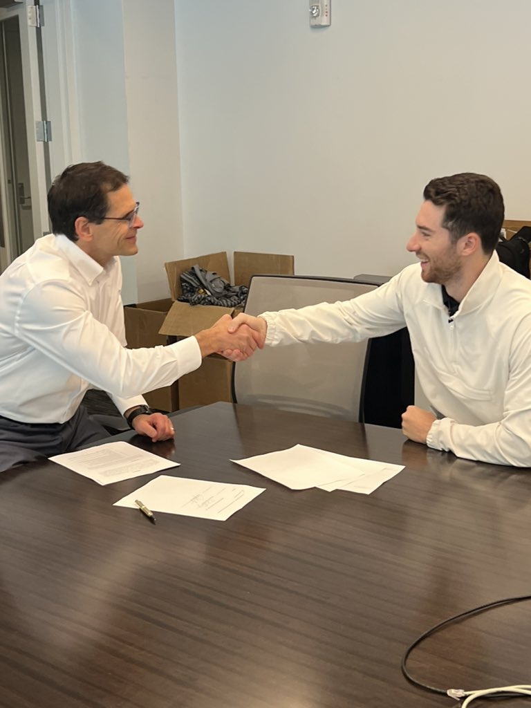 BassKnowsBall's tweet photo. Swayman contract signing https://t.co/6E1euztCa7