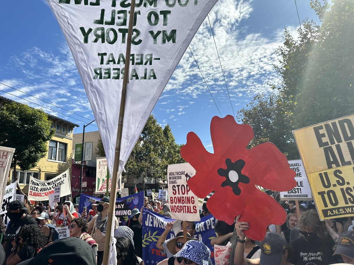 _chrisalam's tweet photo. Right now: large rally at 16th and Valencia protesting one year of Israel’s genocide in Gaza and recent attacks on Lebanon. #SanFrancisco #breaking https://t.co/gutmDvVNPg