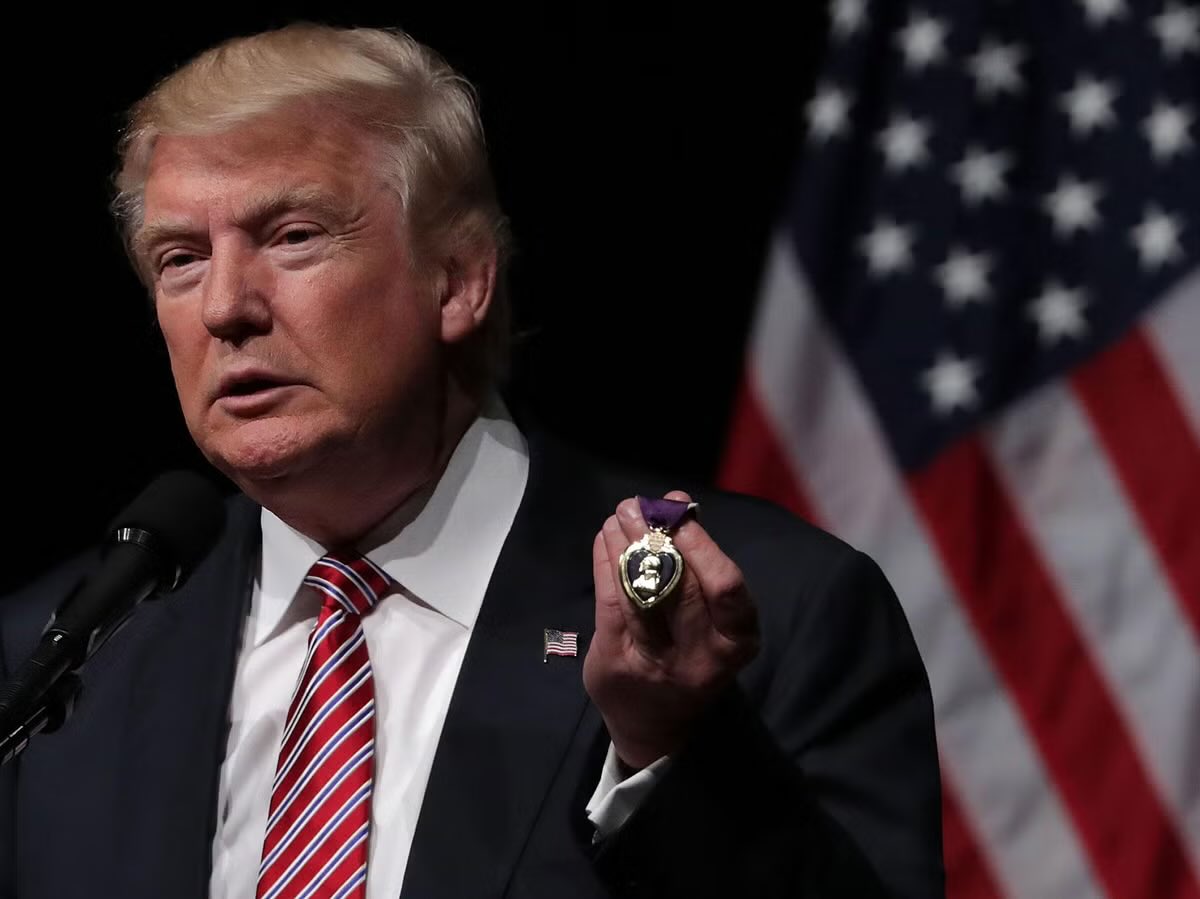 Trump: “I always wanted to get the Purple Heart. This was much easier”
- But the civilian award is better. 
- But the military cemetery is filled with losers. 
- But he likes people who weren’t captured. 
This disgusting excuse for a human being accepts a purple heart gift? 
You