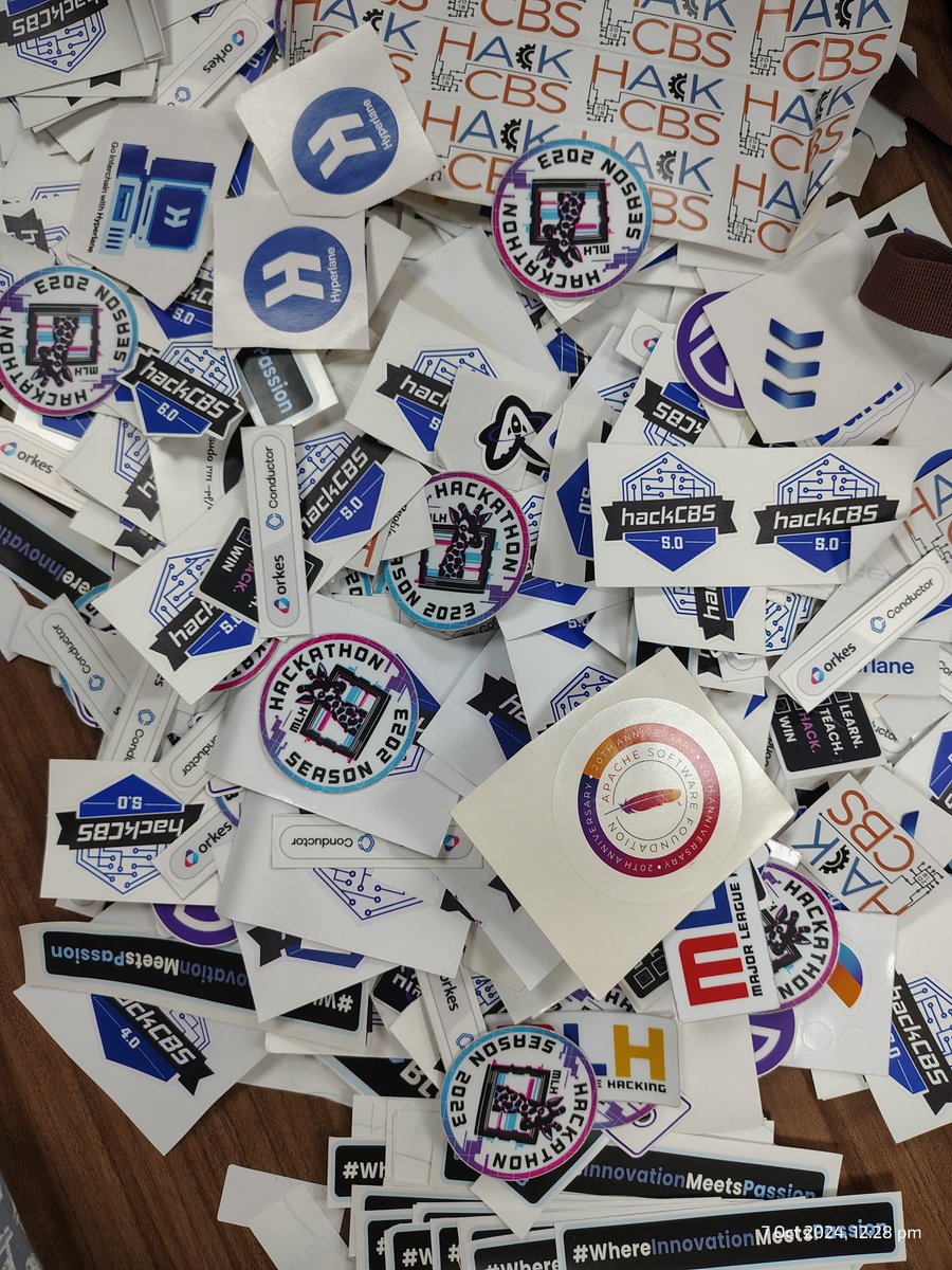 hackCBS's tweet image. Stickers on stickers on stickers! 🎉 Our #hackCBS sticker stash is almost as impressive as the hacks themselves. 🤓💻 Collect them all, trade with friends, and rep your fav tech! Who else loves these? 👀✨ 
#HackathonSwag #HackathonVibes #TechSwag