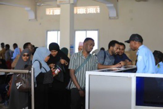 sntvnews1's tweet photo. #PICTURES: Officers of the Immigration and Citizenship Agency at Shati Gadud Airport in #Somalia’s #Southwest State are diligently performing their primary responsibilities of checking passports and assisting citizens. The Agency has equipped immigration officers across the country with training, tools, and technology designed to detect illegal activities, including human trafficking and drug smuggling.