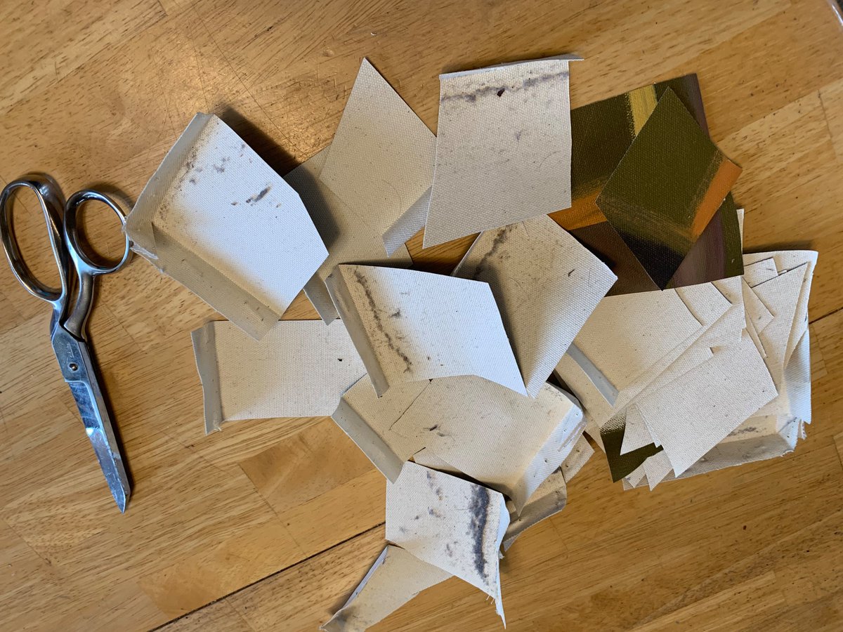 I’m taking my scissors to some of my old student art! I’ll be using the stretcher bars for fiber art (more on that later!) but in the meantime, I’m taking a lot of joy in dismantling it. Under the supervision of my studio manager.