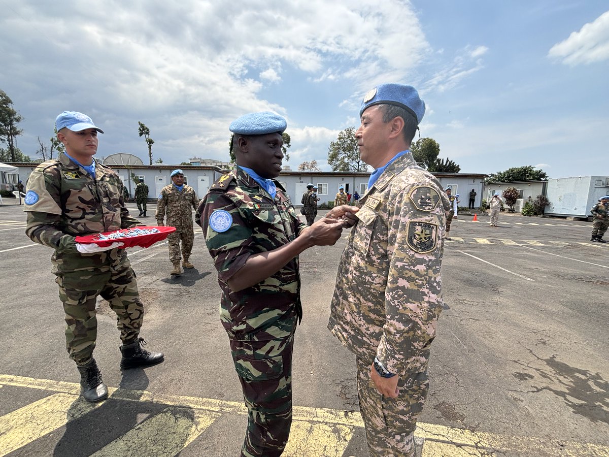 kazcentofficial's tweet photo. In the Democratic Republic of the Congo, Lieutenant Colonel Altynbek Zhalmukhanov and Major Batyr Tuyakov were awarded UN medals for their contribution to maintaining #peace and security. https://t.co/bIiFrMw3dX