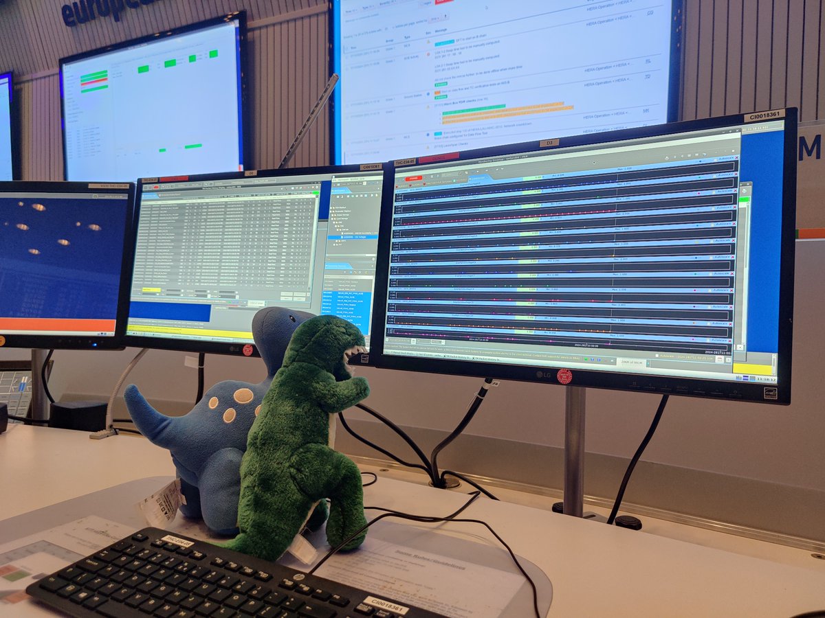 EPenguin's tweet photo. The #dinosaurs Arg ๐ฆ (Grr's brother) and Bronte๐ฆ are busy checking the #HeraMission telemetry from the launchpad. Everything looking good so far at @esaoperations #MissionControlRoom for the @ESA_Hera launch! https://t.co/8FLQSEFLfx