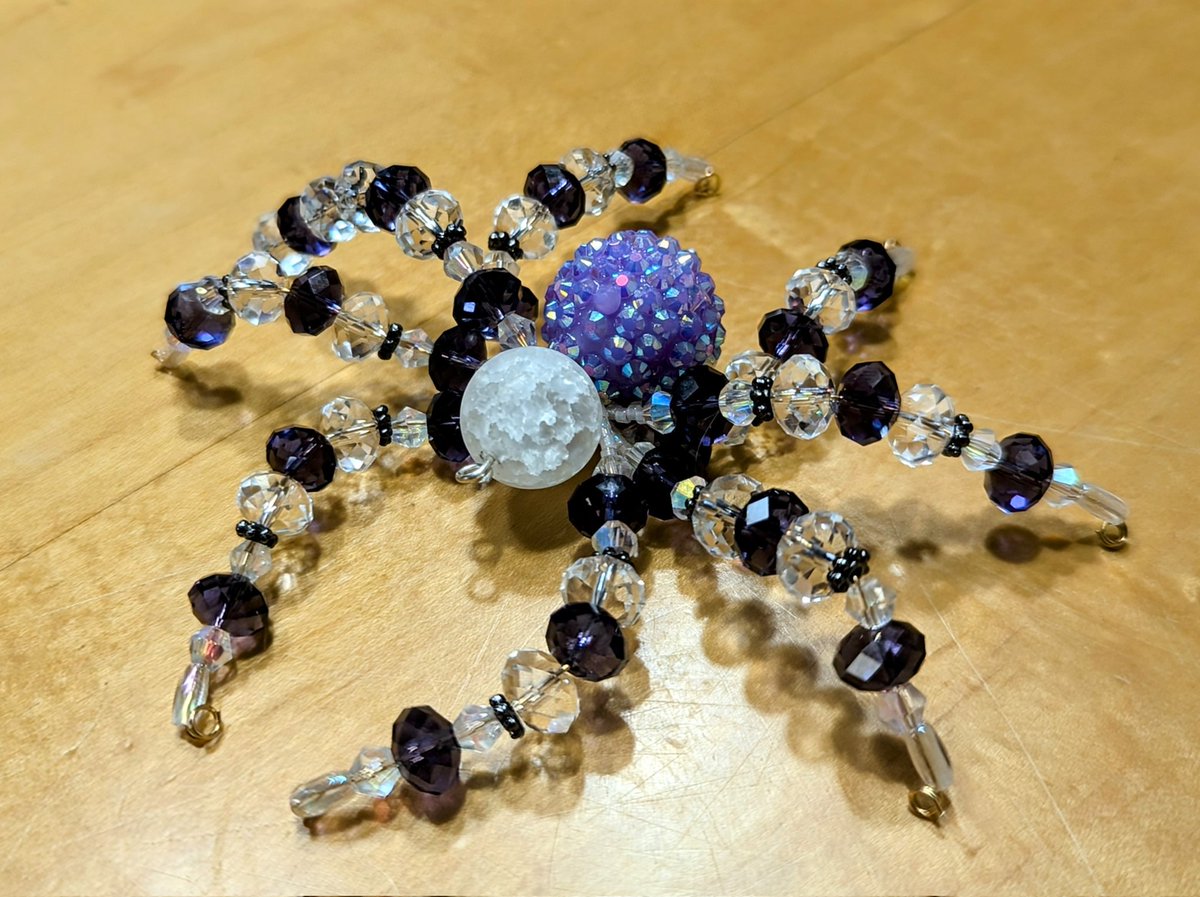 Purple. Large crystal spider
$15.00 plus postage 
I sell crafts to supplement my ODSP income.
