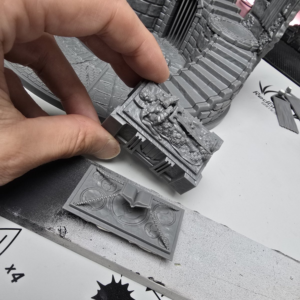 There are two very cool options for the top of Dracula's tomb from the Tomb of DracuIa Terrain Pack by <a href="/atomicmassgames/">Atomic Mass Games</a>; I especially love the floating book idea! 

Luckily they can just be dry fitted and easily swapped out, so I won't have to choose between them... 😁