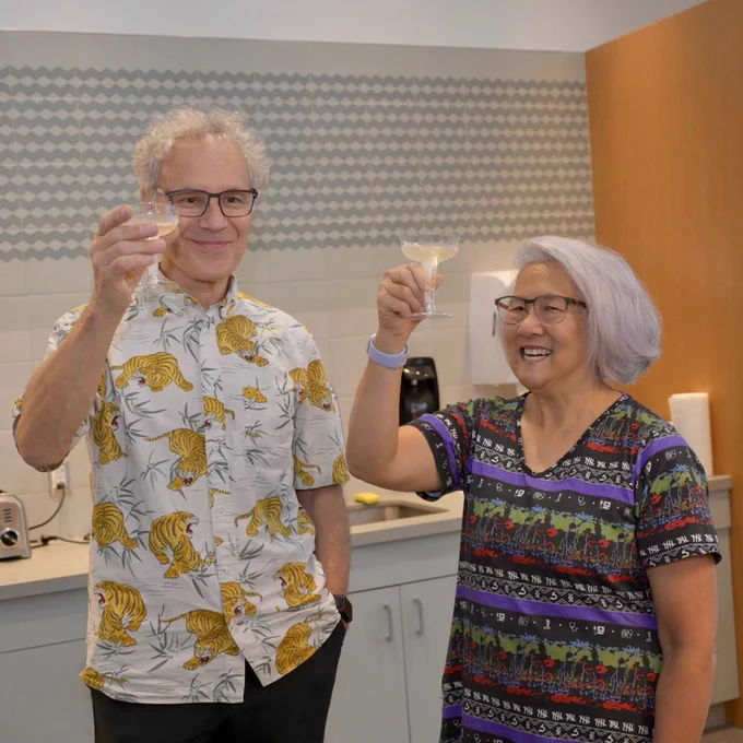 Victor R. Ambros, PhD, and his wife Rosalind "Candy" Lee celebrate with champagne