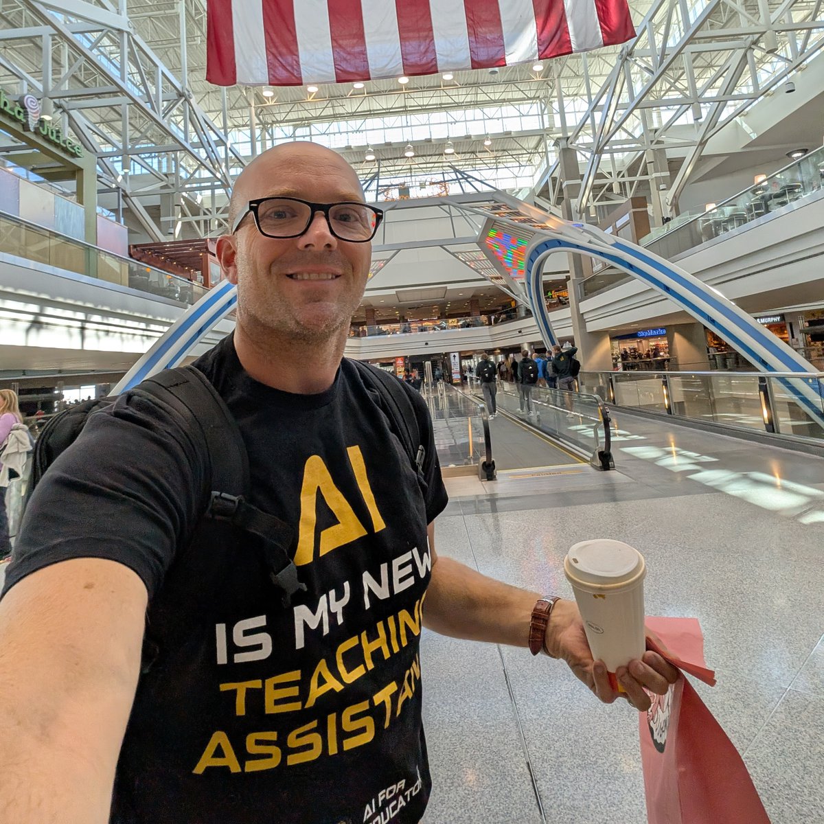 jmattmiller's tweet photo. Gotta do the Denver airport RIGHT! ✈️✈️

Keynote at NDATL in Jamestown, ND tomorrow. But first ...

Novo coffee ☕ 
Voodoo Doughnuts 🍩
... and getting some prep work done! 💻

Gotta sport the AI is My New Teaching Asst t-shirt too! 🛒 https://t.co/IAGAKpdbVT https://t.co/dOi0utXYlp