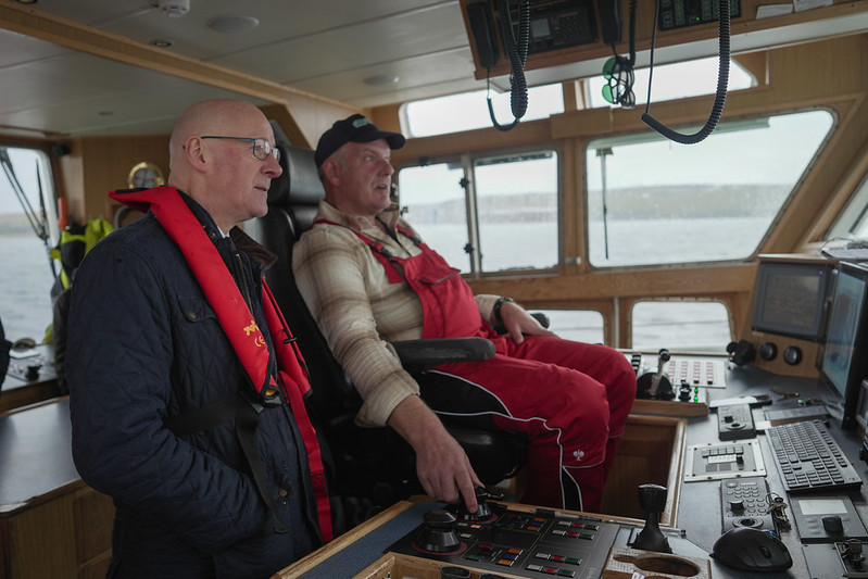 First Minister <a href="/JohnSwinney/">John Swinney</a> visited the busy <a href="/LerwickHarbour/">Lerwick Harbour</a> to learn about its role in Shetland’s economy and green energy transition.
 
<a href="/LerwickPort/">Lerwick Port Authority</a> is part of a project to transform Shetland into a clean energy island powered by renewable resources onshore and offshore.