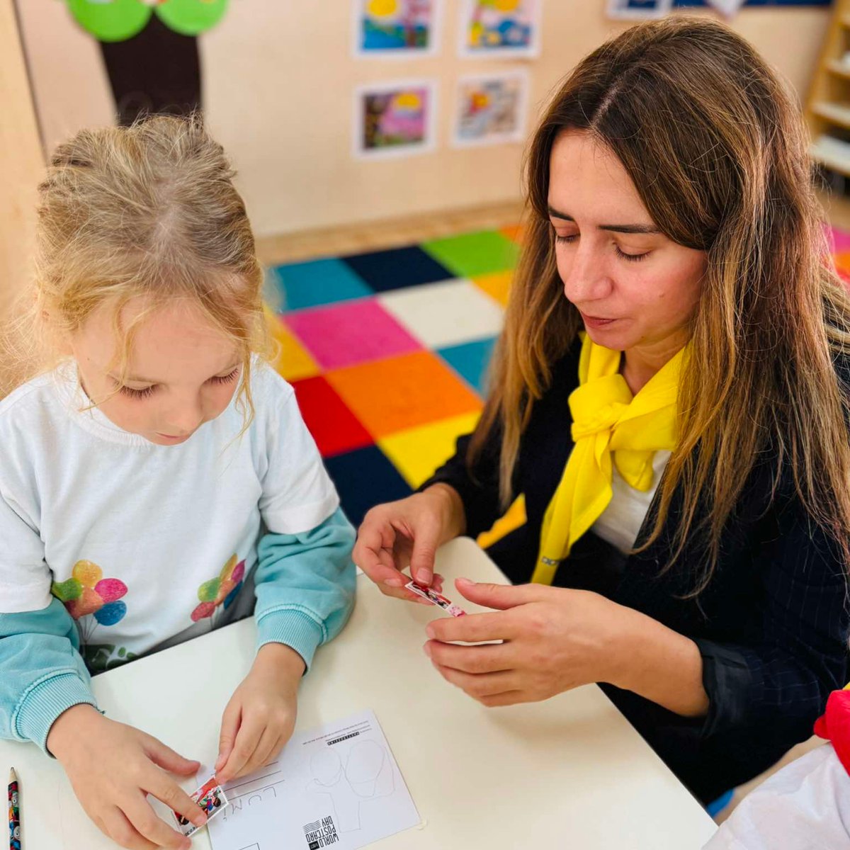 postcrossing's tweet photo. We love seeing children interacting with postcards! For #worldpostcardday this year, Kosovo Post visited a classroom in Pristina and helped the little ones mail their first postcards. Brilliant! 😍 https://t.co/Hv6XjuE4nC