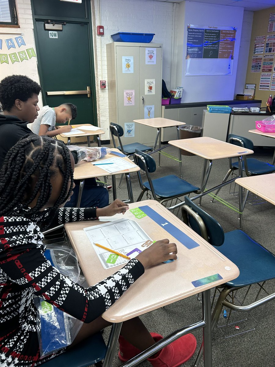 Math students with Ms. Cafcules are working on making equivalent fractions. #BeEvergreen