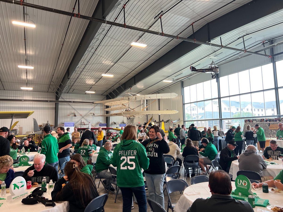 NDChampionsClub's tweet photo. Not the result we had hoped for but at least we had the best time cheering on UND Football at the pregame party 🏈 👏🏼 Thank you @FargoAirMuseum  for the hospitality, thank you to Sidestreet Grille &amp; Pub for the amazing food and thank you to everyone who came out 🤩 https://t.co/Ti4oA4OWqv