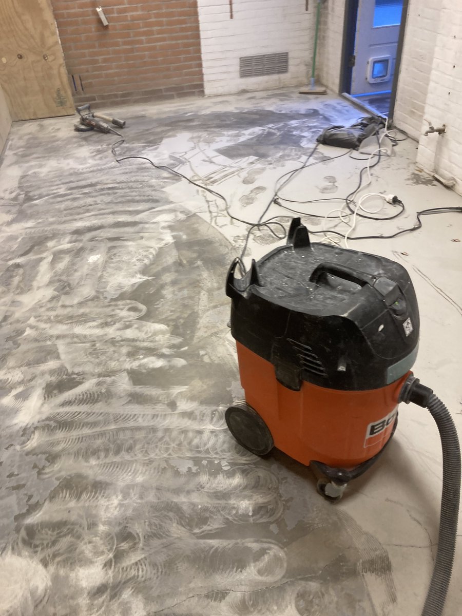 Bike spa, phase two. Removing the poorly done floor coating.