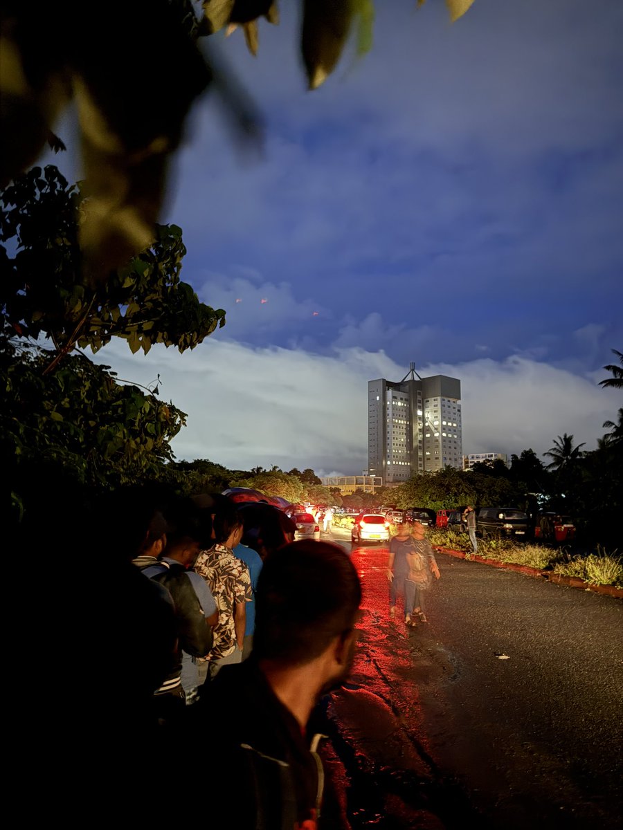rajebro's tweet photo. Came to passport office at 4 30 am to get an appointment. And there’s a huge queue. 

It’s raining also 🥲🥲 https://t.co/E36cdBLGWr