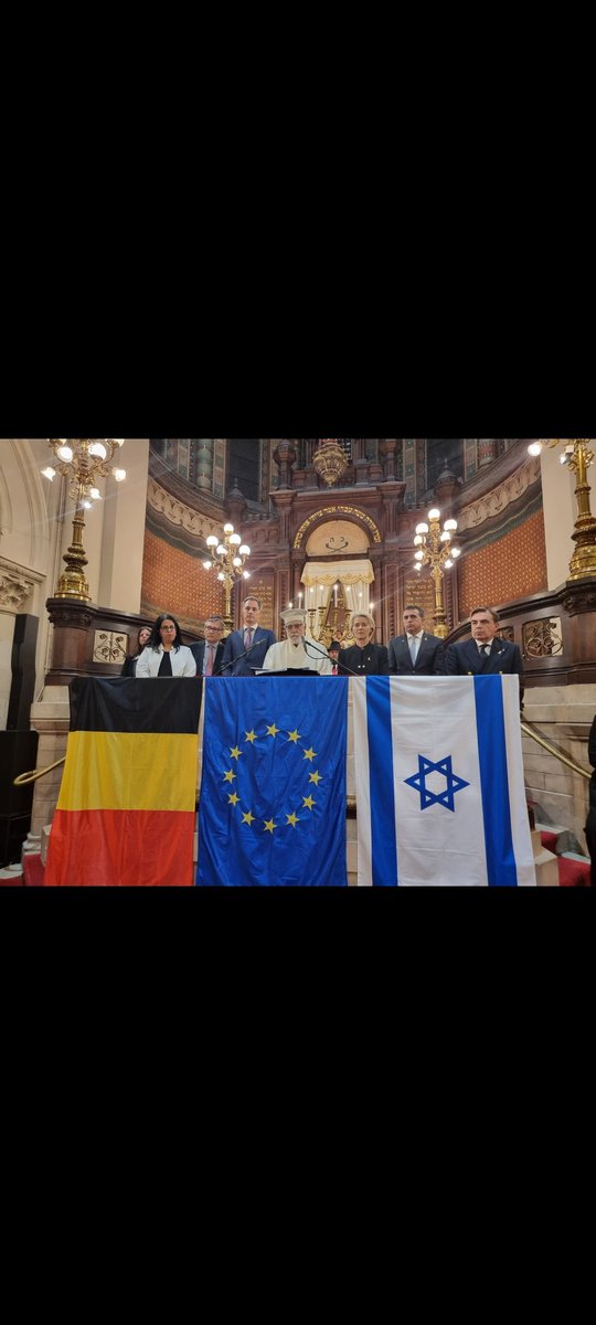 HaimRegev's tweet photo. This evening, The Mission of Israel to the EU & NATO and Embassy to Belgium along with the Jewish Consistoire held a memorial ceremony to mark one year anniversary of Oct. 7  massacre. 

That fateful morning  will be forever curved in our minds and on our souls. We remember the 101 hostages and want to see them home NOW.

I would like to express my deepest appreciation to  the president of the European commission @vonderleyen for her participation, emotional speech, and steadfast support for both Israel and Jewish Communities. 
As well as, VP @margschinas who honored us with his presence. 
#BringThemHome #RememberOct7