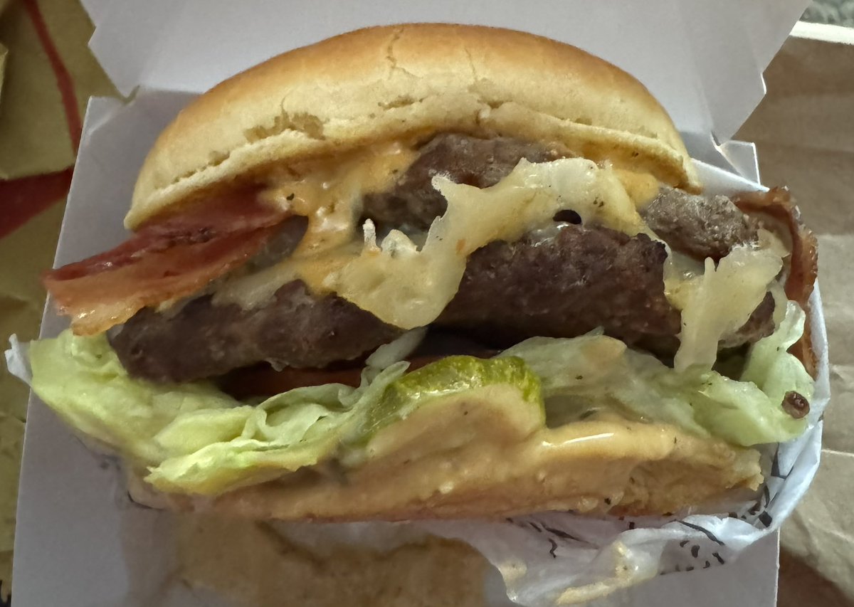 hydrokenshi7's tweet photo. Fast Food Halloween First Impression & Reaction
Burger Series #1: Carl’s Jr
1st Item = Double Big Angus The Ghost Burger with extra sauce

Pros:
-Soul Scorching sauce has so much flavor. The heat is present and lingering spice on the mouth but not overwhelming.
-Big Angus patties is juicy and full of seasoning
-Potato Bun is lightly toasted and I love the idea for this burger
-Lettuces and Tomatoes add texture and freshness
-Burger is big and enormous 

Improvements:
-I wish the soul scorching sauce is a little bit more spicier having a kick on the throat since Carl’s Jr advertise it as very hot.
- Bottom bun is soggy. I feel like adding extra sauce made it mushy and fall apart. But the vegetables were at the bottom as well. The placement of ingredients is what could make the burger better.
-Didn’t know the bacon was there. Wish the texture of the bacon were crispier.
-I wish the burger was theme a bit more to fit the Halloween setting since the burger is called “The Ghost.” Maybe white bun or feature of a ghost with see-through quality.
-Price is expensive for one burger with no combo wish it was lowered

Final Verdict: (Fast Food Scale)
C+