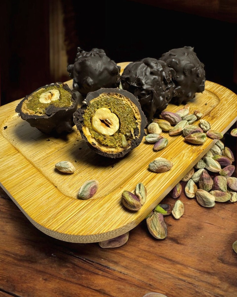 ChocoMuse_'s tweet photo. Meet our latest sensation: Kunafa Rocher Chocolate! 🍫✨ 

Imagine the crispiness of kataifi and the crunch of hazelnuts, all wrapped up in a dark chocolate shell. Inside? A heartful of rich, creamy pistachios that’ll have you saying, “Ye Dil Maange More!” https://t.co/fkxliCQ9hM