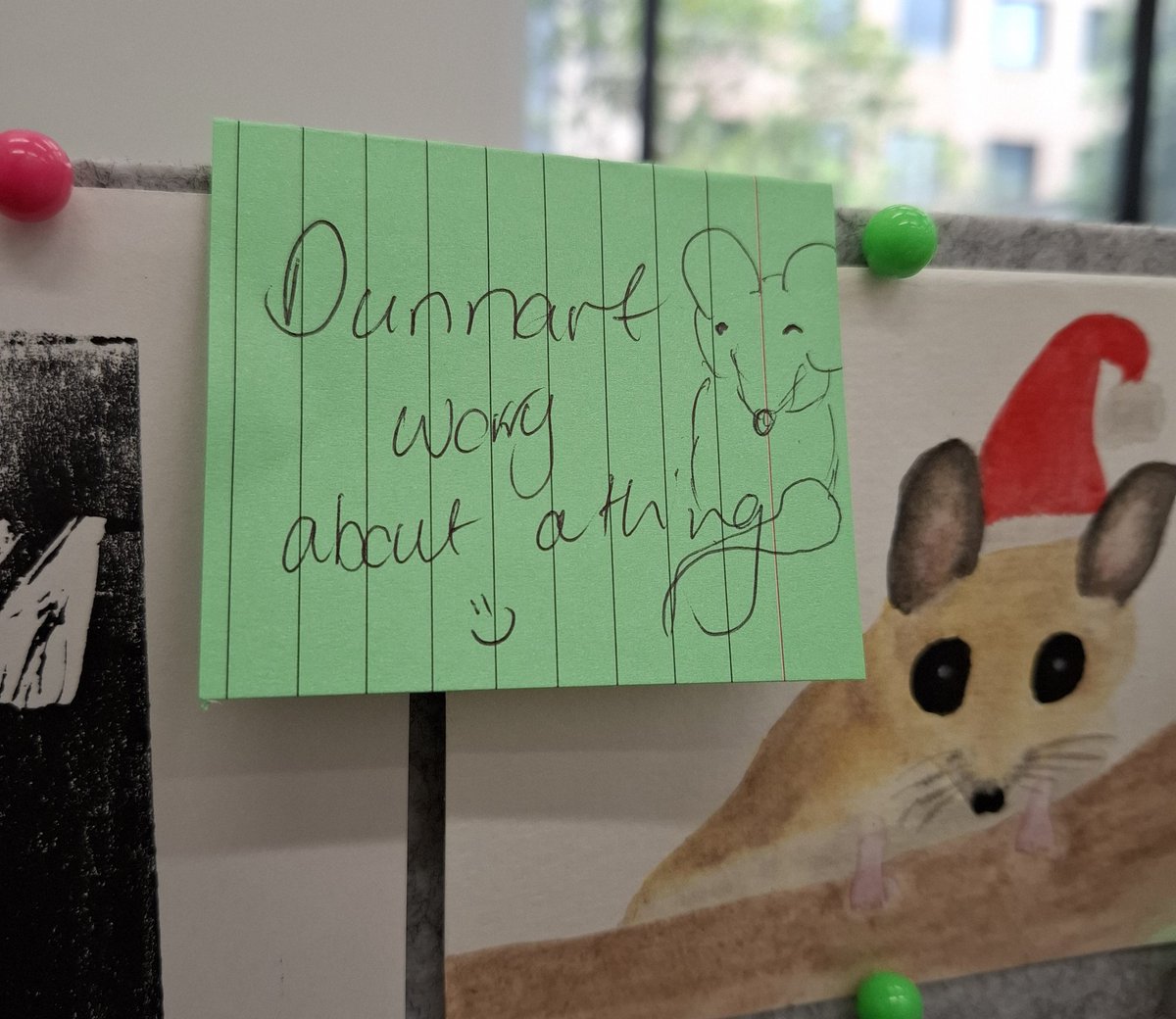 I'm sitting at my desk, obviously a bit flustered and stressed. 
Hand appears from behind my desk and tucks this note in front of me 🥰#Dunnart worry about a thing 🙏
How amazing are caring colleagues? Grateful for <a href="/Jendometrium/">Jennifer Hutchison</a>! 
#WomenInSTEM #womeninscience