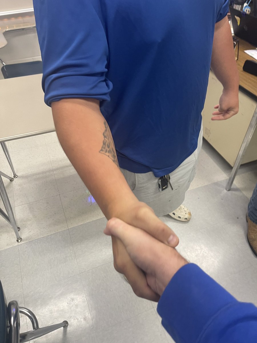 coachkkirk7's tweet photo. The proper handshake can leave a lasting impression. Love our dudes! #TheCougarWay https://t.co/5c7LULVttv