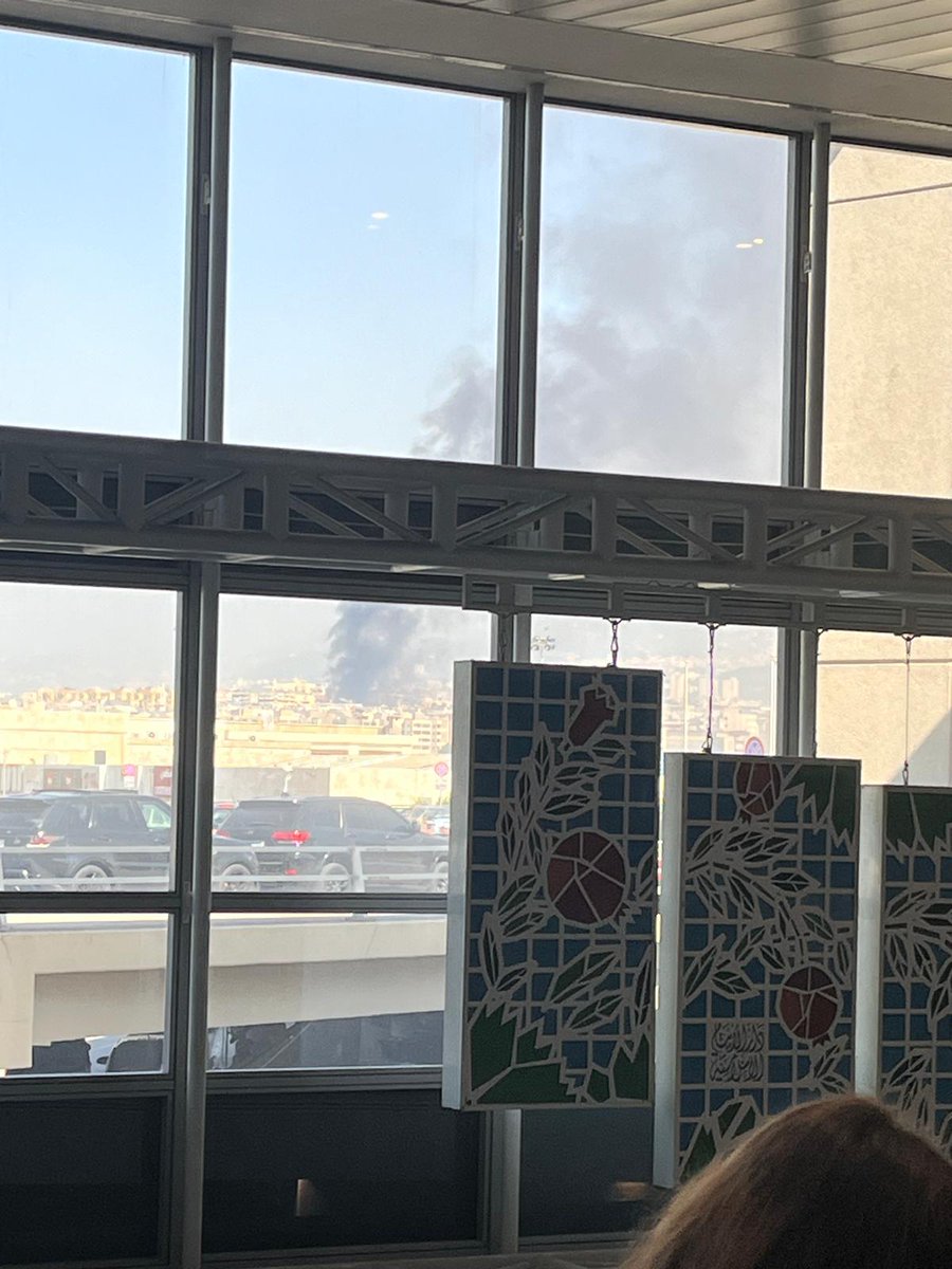 eromanos2's tweet photo. This is the view from #Beirut #Airport right now. As smoke covers the air from an earlier #explosion, people are still waiting to board their aircraft. #Lebanon resilience. https://t.co/1yUS1jjlDP