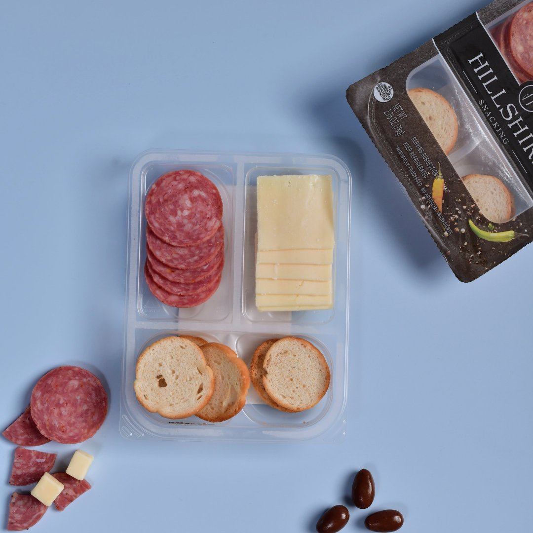 In the snack pack game? Transition your laminated tray to one that aligns with your ESG goals and is guaranteed to fit your current seal equipment. Learn more at hubs.ly/Q02F1fC90