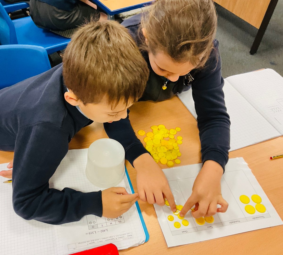 WoodchurchRoad's tweet image. Crew 4 have been grappling with manipulatives in maths this week. Collaboratively solving problems! Together we are stronger! 
#crew #masterymaths