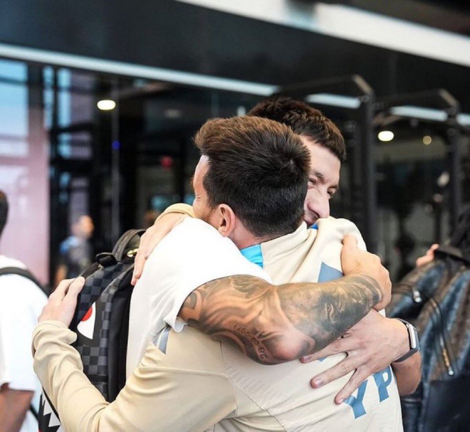 Leo Messi with <a href="/LisandrMartinez/">Lisandro Martinez</a>
