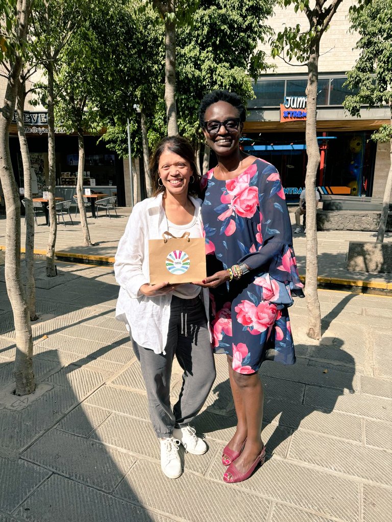 Sharing meaningful gifts during this #CustomerServiceWeek . Today we gave #chantal a climate action toolkit for SMEs in tourism. She will use this to support the climate agenda of small businesses in her tourism supply chain. #sttaclimate #ClimateActionNow 
#sttaconsultingAfrica