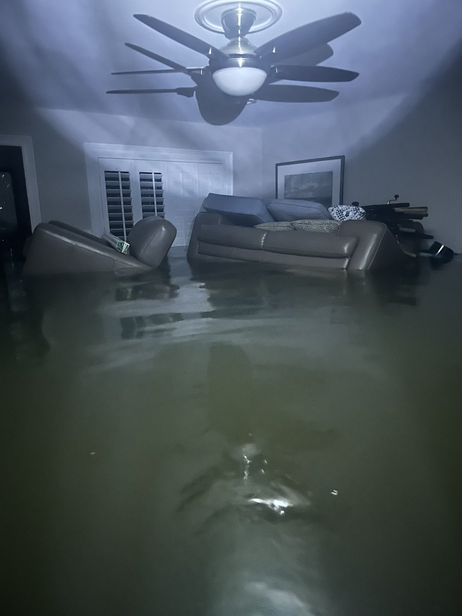Latest look at our house in Florida after #HurricaneHelene flooded it 🌊 All gutted now like thousands of other houses in Pinellas County with everything everyone owns sitting on miles of roads like the pile behind me in our street 😳 Now #HurricaneMilton has this debris and