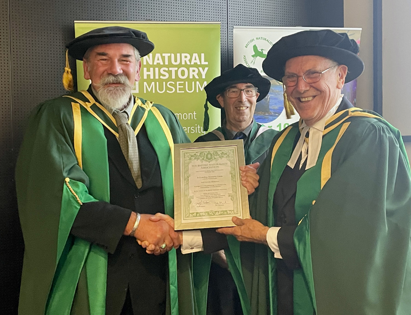 BNA science (@bnascience) on Twitter photo Neil Garrick Maidment being bestowed with Fellowship Honoris Causa at British Naturalists' Association Encaenia in the <a href="/NHM_London/">Natural History Museum</a> from President Roger Tabor, & (behind) Chairman Steve Rutherford Neil Garrick Maidment being bestowed with Fellowship Honoris Causa at British Naturalists' Association Encaenia in the <a href="/NHM_London/">Natural History Museum</a> from President Roger Tabor, & (behind) Chairman Steve Rutherford