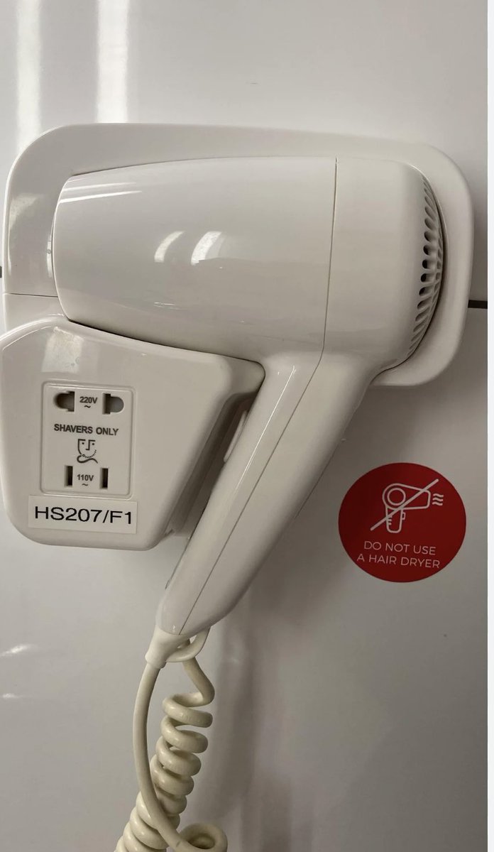 Colleenlduggan's tweet photo. @sarajcox Hotels offering this as a hairdryer will be immediately shut down and unable to trade until they replace them with actual hairdryers (with nozzles) https://t.co/Y6UXzXA6N2