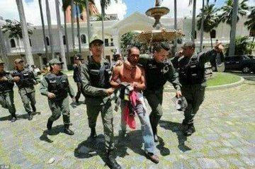 RealOmtatah's tweet photo. On this day of June, 2017 protesters Storms Venezuela National Assembly, beat politicians into fine pulp. https://t.co/IdNui4KyRs