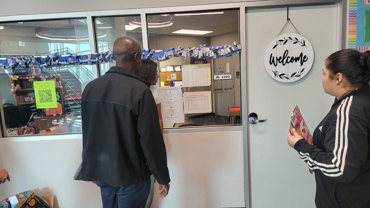 Teacher leaders discuss the PBIS points awarded that is displayed on the RICC Leadership Board....It's all about promoting and recognizing improvements made towards positive behaviors. #Respect #Integrity #Courage #Compassion (RICC)
