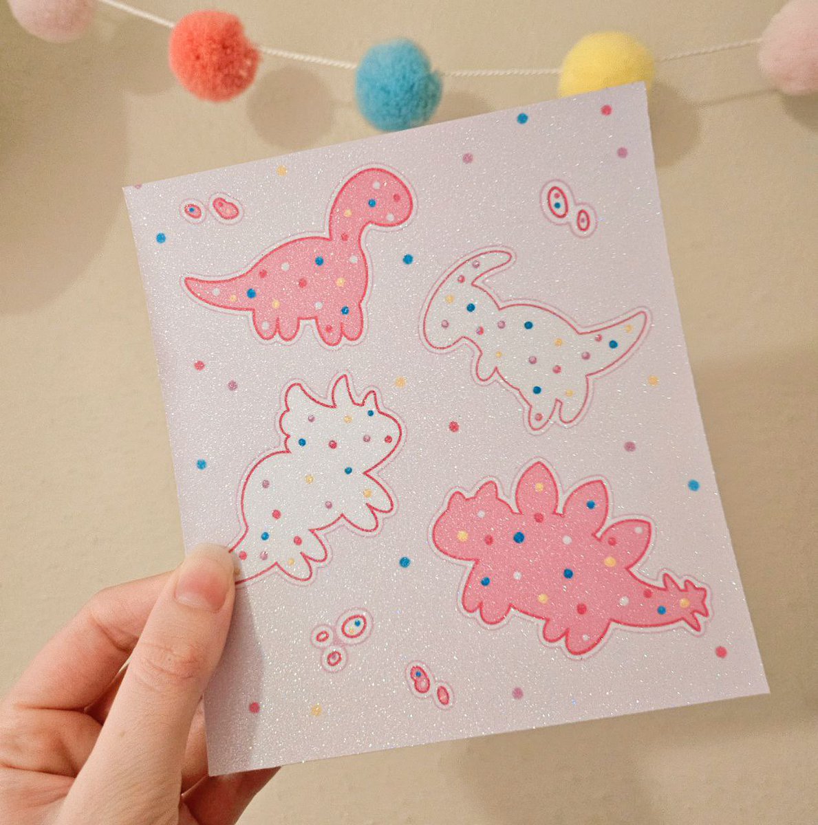 sprinklefawn's tweet photo. circus dino cookies 💗🥹 i love these little guys so i made a test glitter print! https://t.co/h8p2RnTmGU