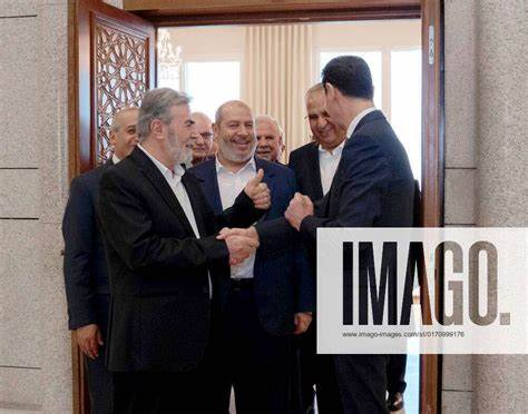 Thedesigningguy's tweet photo. @Astudent1r Yeah bud, and I'm sure this is all Zionist propaganda too, sharing old pictures doesn't change the now.
Hamas chief of Arab relations Khalil al-Hayya told reporters in Damascus in 2022.

"This is a new start for joint Palestinian-Syrian action," https://t.co/xufBzQFhsP