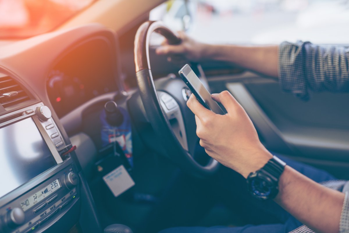 🚨 Did you know keeping your phone in the car's cup holder could cost you up to £1,000 in fines?

🚨Under new UK laws, using a phone that's not in a secure holder while driving could lead to hefty penalties!

#RoadSafety #TravelTips #StayLegal #UKDrivingLaws