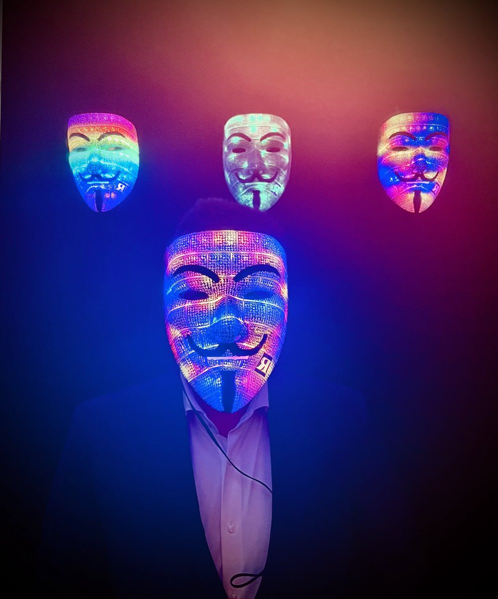 rebelmoneyart's tweet photo. Who is the real ⁦@polymerbit⁩ ?Mask of Legion in ⁦@BitcoinConfEUR⁩ and bidding on ⁦@scarcedotcity⁩. #bitcoinart #wearebitcoin #wearelegion https://t.co/fQLwzjgCvn
