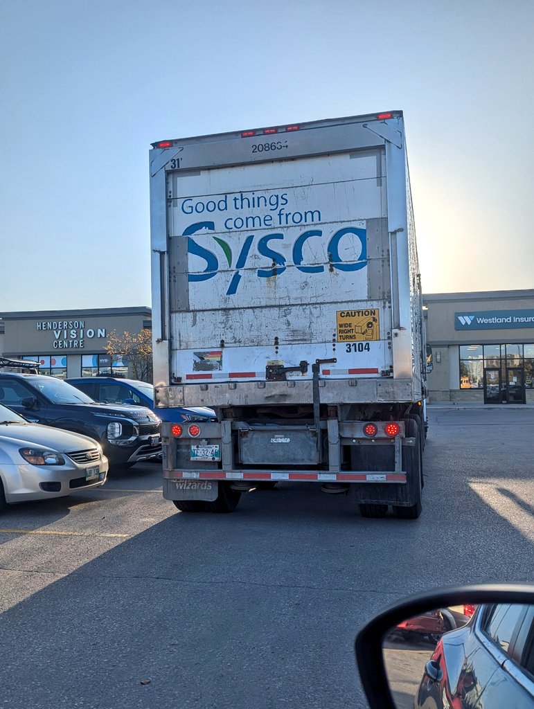 Trippyfalls's tweet photo. @Sysco is it ok for your trucks to block parking lots? it was almost impossible for me to get out of my parking spot today and they wouldn't move. all they were doing was listening to music https://t.co/CRh2R41xFL