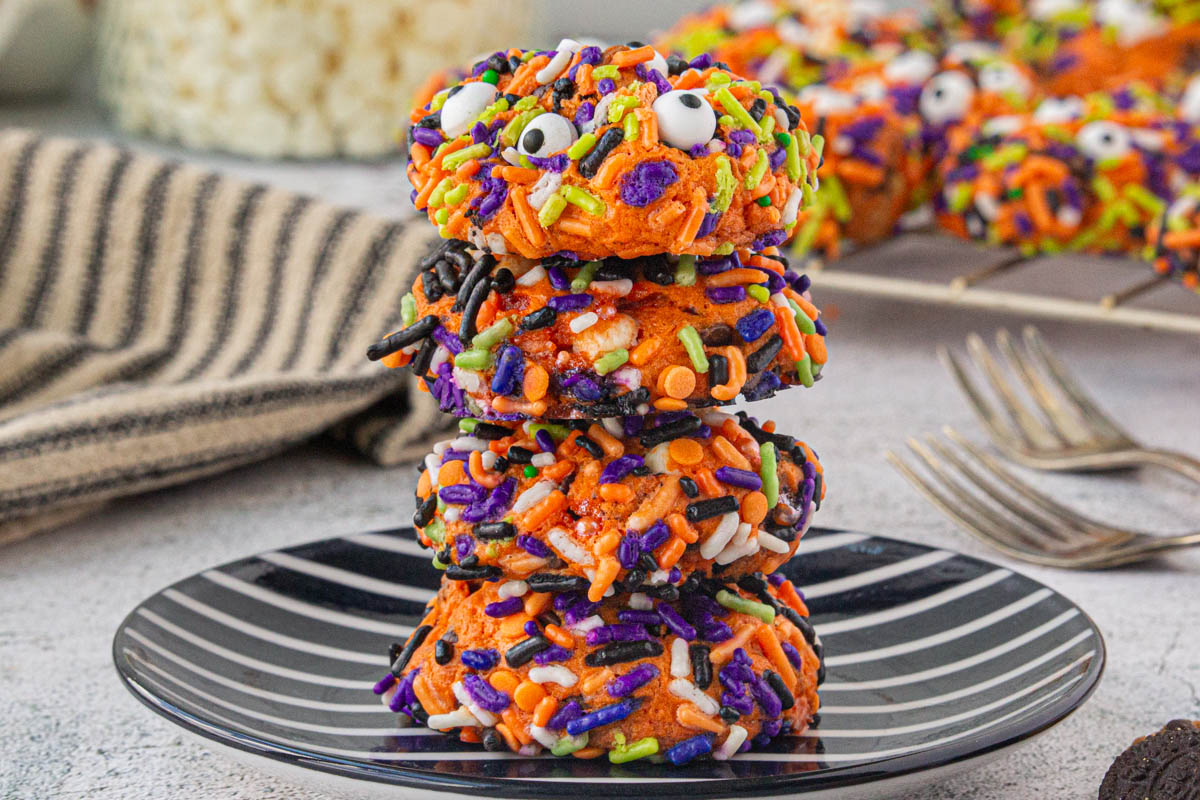 Chewy, delicious Halloween Monster cookies made with a cake mix, are the perfect sweet treat for parties for kids and adults! bowl-me-over.com/monster-cookie…