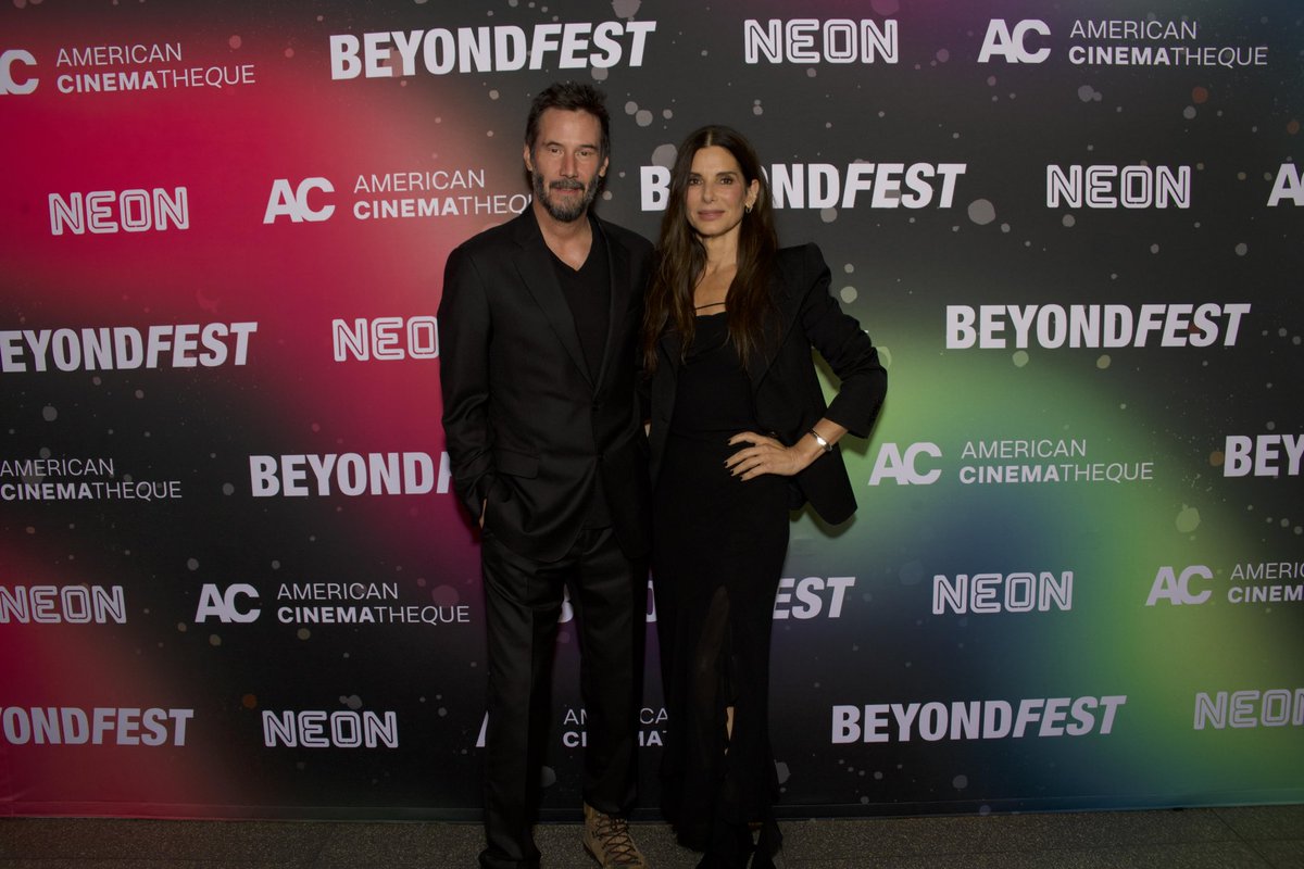 extratv's tweet photo. Sandra Bullock and Keanu Reeves reunited for a 30th Anniversary screening of “Speed” at Beyond Fest at American Cinematheque! ❤️ 

(📷: Jared Cowan for Beyond Fest at American Cinematheque at Egyptian Theatre) https://t.co/dnUzVnOytV
