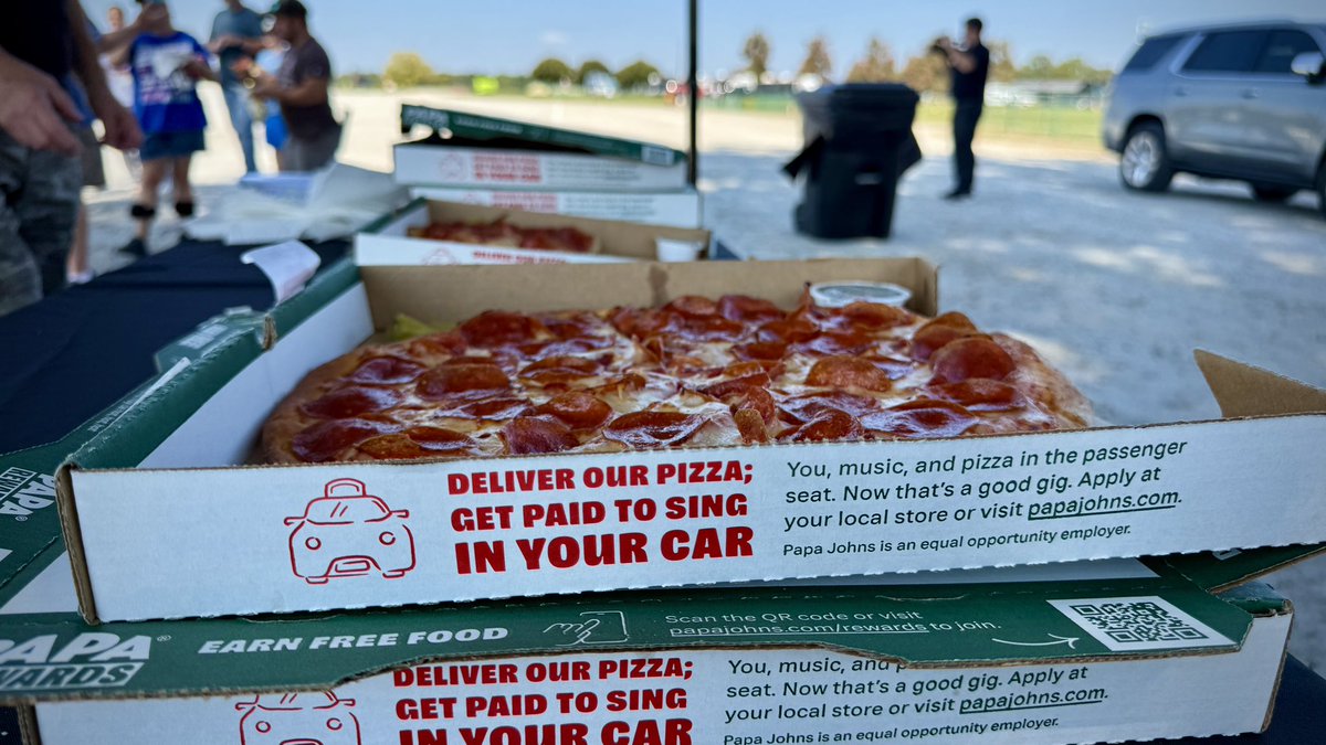 Serving up pizza for our evacuees. It’s all about community around here. Thank you <a href="/PapaJohns/">Papa Johns</a>!