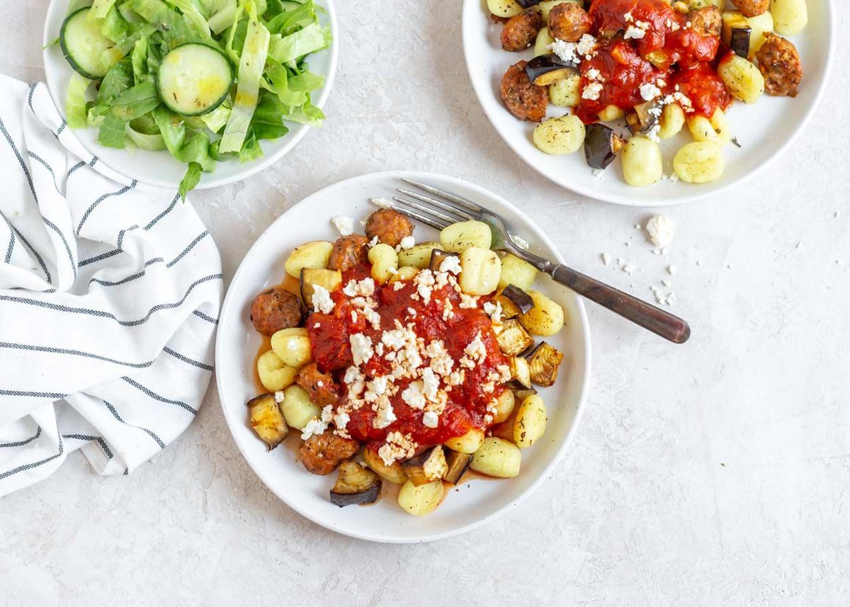 Gnocchi with Eggplant and Sausage | Chewy gnocchi, tender chunks of zesty sausage, and roasted eggplant make an out-of-this-world pasta bowl. These hearty flavors are balanced by a bright tomato sauce spiked with peppery harissa.  buff.ly/489q2c1  #nowcooking