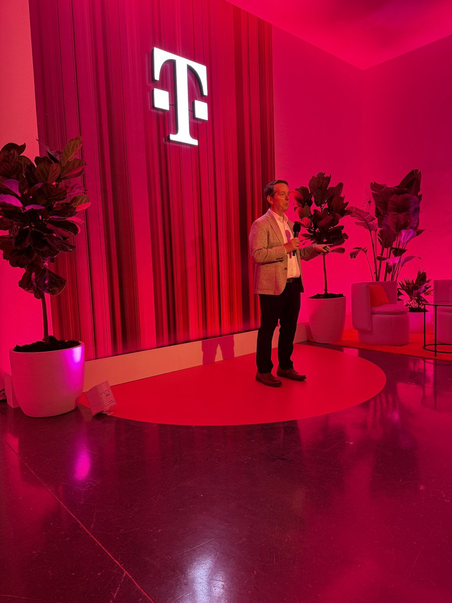 greengart's tweet photo. .@TMobile event kicking off in NYC. No filters; it’s very magenta in here. https://t.co/n7HBlZksyL