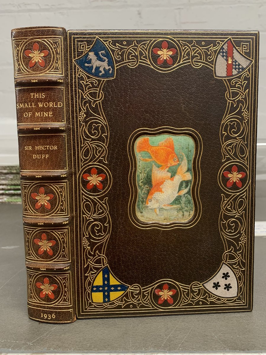 Another #randomphoto from my collection.

An inlaid leather binding with vellucent inset of goldfish in this Chivers #bookbinding  for Sir Hector Duff who loved beautiful bindings and #heraldry