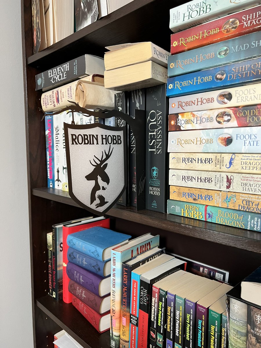 ColinsCornerYT's tweet photo. Don’t think this company has an X account, but look for Belligerently Bookish on Etsy if you want in on some of this action. So happy with this purchase. @robinhobb #fantasybooks #bookshelves https://t.co/BdBqnFVRE4