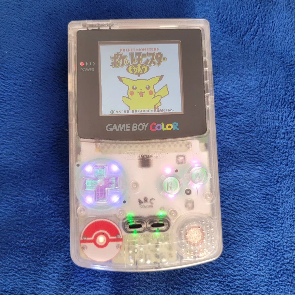 HostsServer's tweet image. Jumping into the retro modding scene. First project CIB #Gameboy Color that had a sun damaged screen, put in a Hispeedido 2.45&quot; IPS display, FP clear speaker, lab15 clear opal buttons, ARC gbc led flex board by @natalie_thenerd and the Pokeball power regulator from @JackvMakes.