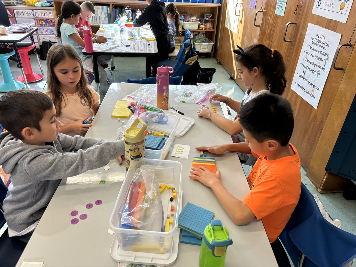 Working with partners to represent numbers in multiple ways—with base ten blocks and with number disks! #ewlearns <a href="/NorthSideEW/">North Side School</a>